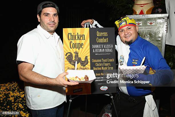 Chefs Donnie D'Alessio and Hernan Heras of Queens Comfort pose with their dish Cinnamon Toast Crunch Chicken Fingers, Bourban Maple Syrup at Chicken...