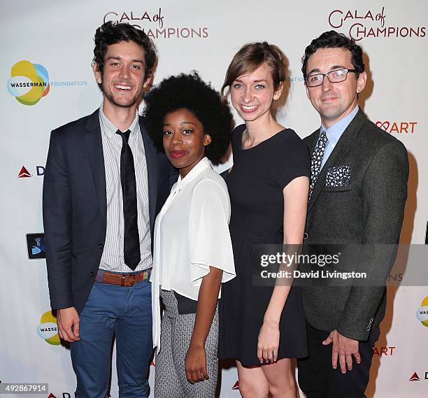 Actors Mike Castle, Diona Reasonover, Lauren Lapkus and Matt Cook attend the CoachArt 2015 Gala of Champions at The Beverly Hilton Hotel on October...