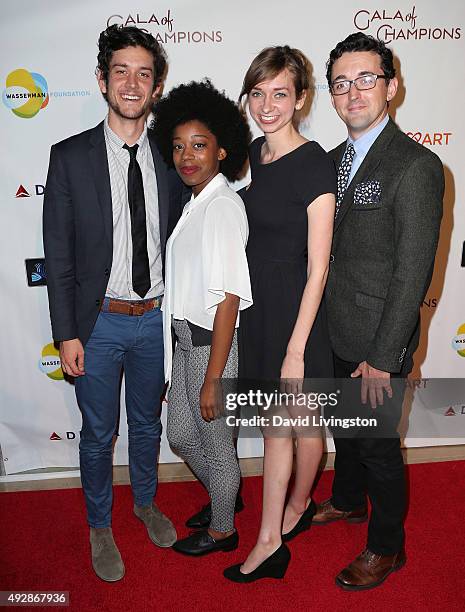 Actors Mike Castle, Diona Reasonover, Lauren Lapkus and Matt Cook attend the CoachArt 2015 Gala of Champions at The Beverly Hilton Hotel on October...