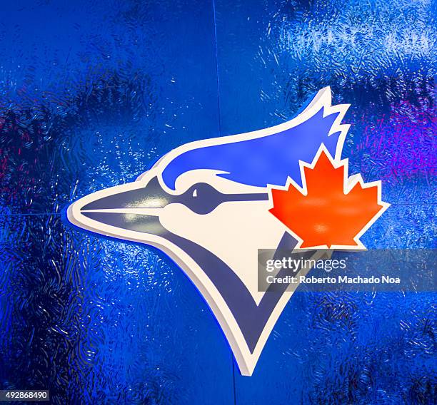 Square Logo of the Toronto Blue Jays baseball team on a blue frosted glass. The logo features the head of the 'Blue Jay' bird and the Canadian maple...
