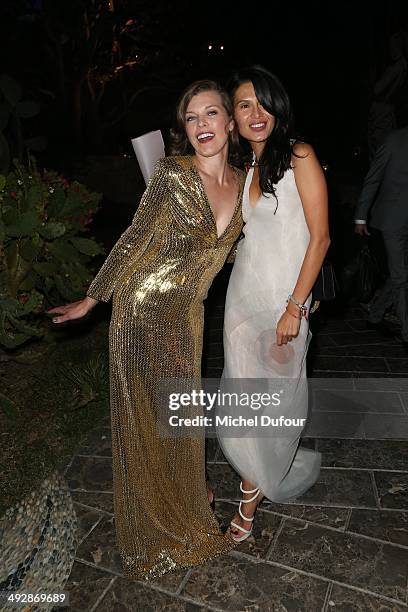 Milla Jovovich and Goga Askenazi attend the Puerto Azul Experience: Inside Party at the 67th Annual Cannes Film Festival on May 21, 2014 in Cannes,...