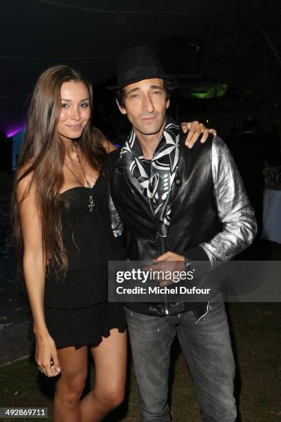 Lara and Adrien Brody attend the Puerto Azul Experience: Inside Party at the 67th Annual Cannes Film Festival on May 21, 2014 in Cannes, France.