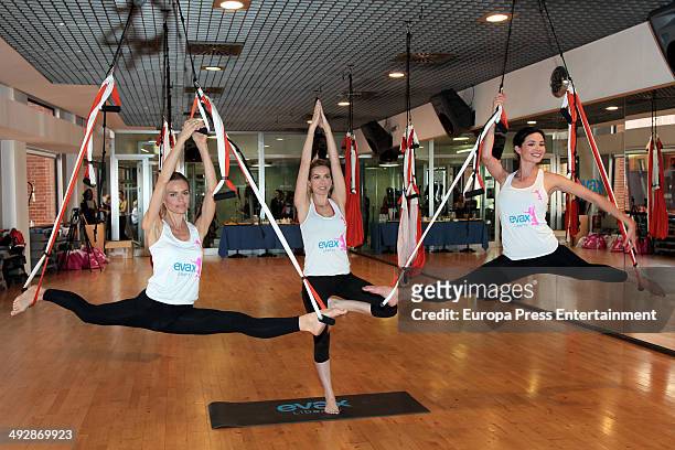 Actress Dafne Fernandez, actress Kira Miro and model Veronica Blume attend yoga air masterclass by Evax on May 21, 2014 in Madrid, Spain.