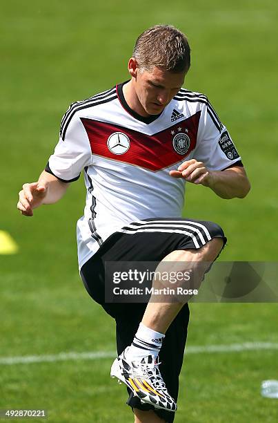 Bastian Schweinsteiger warms up during a training session St. Martin training ground on May 22, 2014 in San Martino In Passiria, Italy.