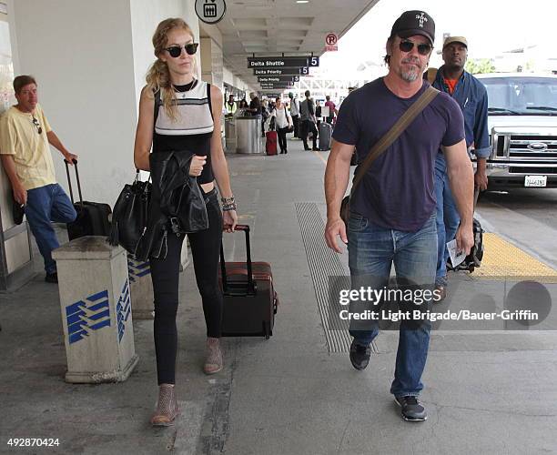 Kathryn Boyd and Josh Brolin are seen at LAX on October 15, 2015 in Los Angeles, California.