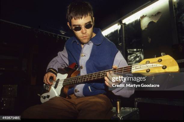 Ian Brown of the Stone Roses plays bass guitar during a rehearsal in Manchester, United Kingdom, 1994.