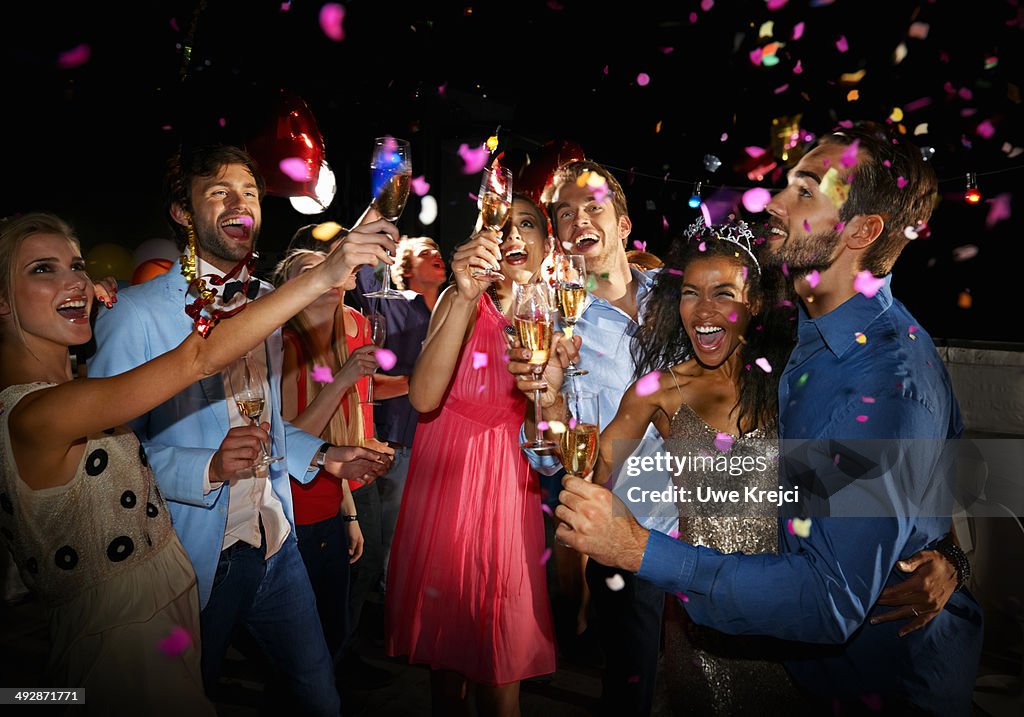Friends celebrating at New Year's Eve party