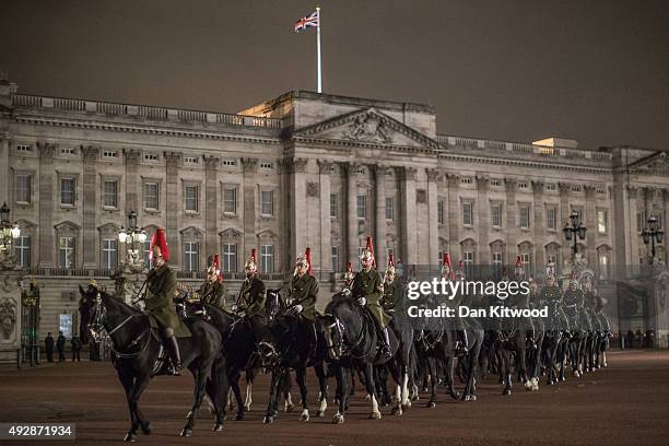 Guard of Honour comprising 96 rank and file and three officers from 1st Battalion Grenadier Guards, with The Queens Colour, The Corps of Drums of the...