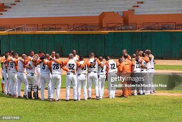 Cuban baseball:Team Villa Clara keeping a minute of silence due to the death of the father of Asiel Alvarez, a star pitcher in the team and team Cuba...