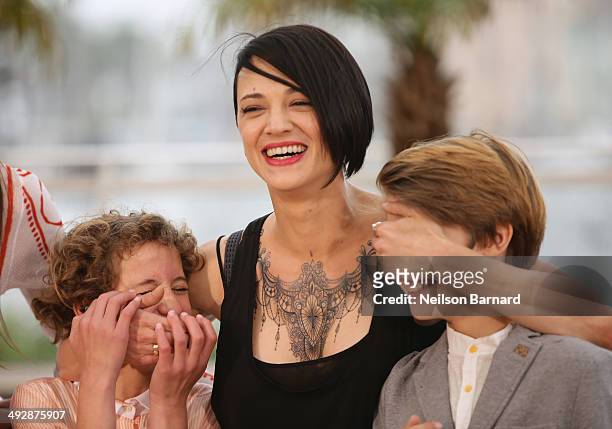 Actress Giulia Salerno, director Asia Argento and actor Andrea Pittorino attends the "Misunderstood" photocall at the 67th Annual Cannes Film...