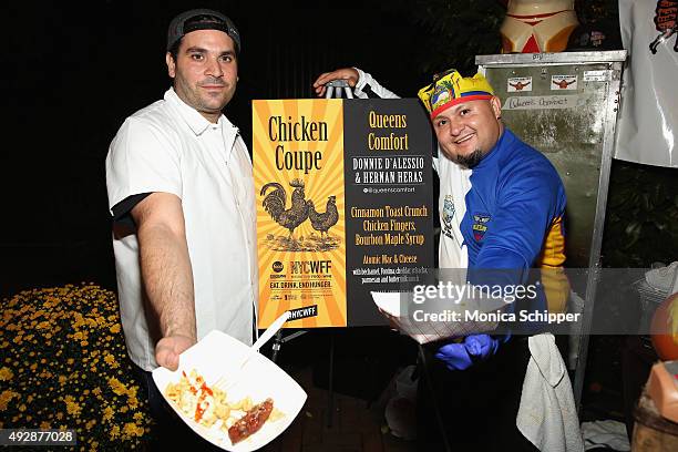 Chefs Donnie D'Alessio and Hernan Heras of Queens Comfort pose with their dish Cinnamon Toast Crunch Chicken Fingers, Bourban Maple Syrup at Chicken...