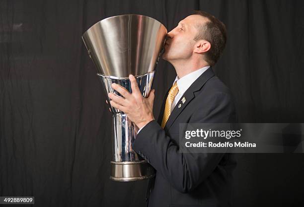 David Blatt, Head Coach of Maccabi Electra Tel Aviv poses during the Turkish Airlines Euroleague Final Four Champions Photo Sesion with Trophy at...
