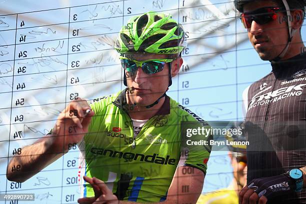 Michel Koch of Germany and Cannondale signs on ahead of the eleventh stage of the 2014 Giro d'Italia, a 249km medium mountain stage between...