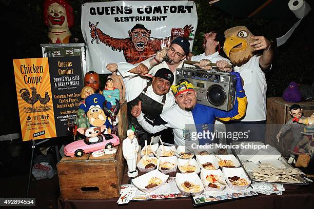 Chefs Donnie D'Alessio, Hernan Heras, and staff of Queens Comfort pose with their dish Cinnamon Toast Crunch Chicken Fingers, Bourban Maple Syrup at...