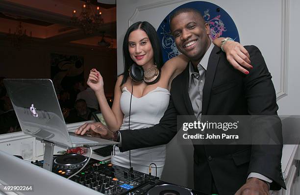 Michelle Pooch spins during the Lennox Lewis Haute 50th Birthday Celebration Hosted By Haute Time, Audemars Piquet, And Perrier Jouet at Bagatelle...