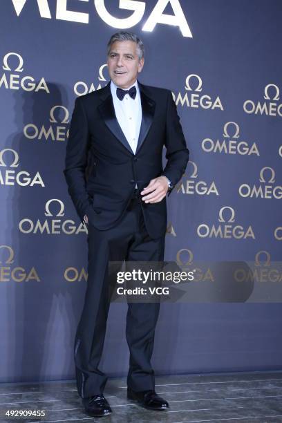 Actor George Clooney arrives for the red carpet of Omega Le Jardin Secret dinner party on May 16, 2014 in Shanghai, China.