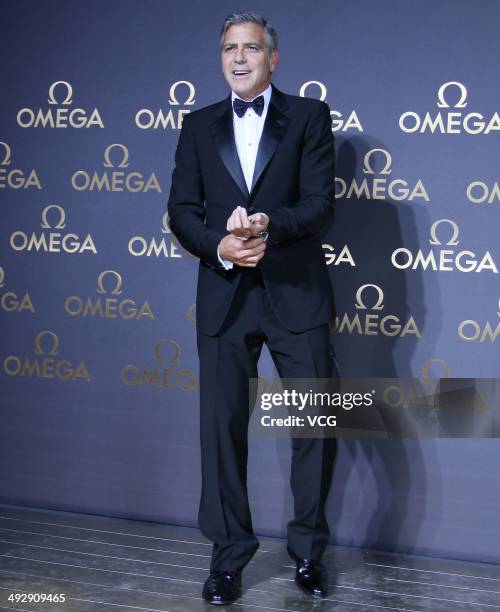 Actor George Clooney arrives for the red carpet of Omega Le Jardin Secret dinner party on May 16, 2014 in Shanghai, China.