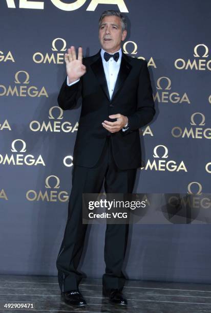 Actor George Clooney arrives for the red carpet of Omega Le Jardin Secret dinner party on May 16, 2014 in Shanghai, China.