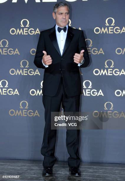 Actor George Clooney arrives for the red carpet of Omega Le Jardin Secret dinner party on May 16, 2014 in Shanghai, China.