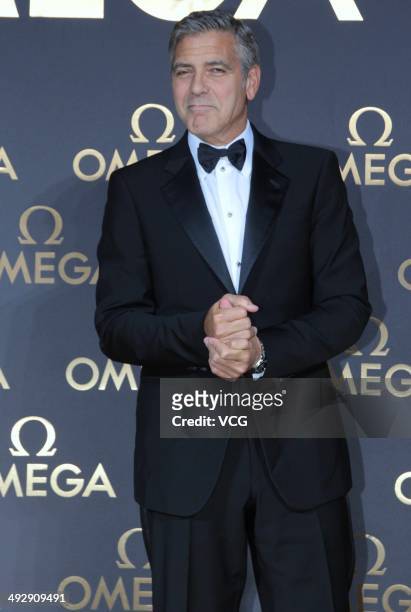 Actor George Clooney arrives for the red carpet of Omega Le Jardin Secret dinner party on May 16, 2014 in Shanghai, China.