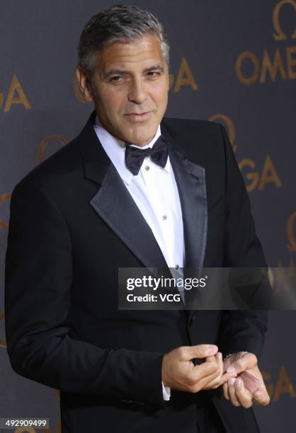 Actor George Clooney arrives for the red carpet of Omega Le Jardin Secret dinner party on May 16, 2014 in Shanghai, China.