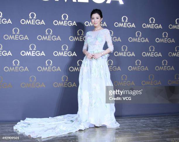 Actress Charmaine Sheh arrives for the red carpet of Omega Le Jardin Secret dinner party on May 16, 2014 in Shanghai, China.