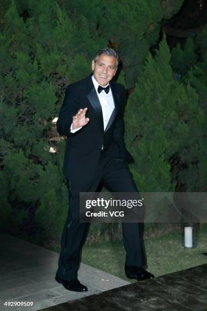 Actor George Clooney arrives for the red carpet of Omega Le Jardin Secret dinner party on May 16, 2014 in Shanghai, China.