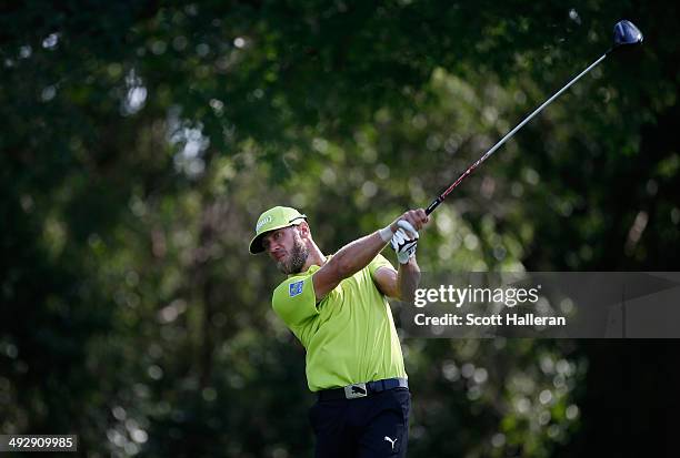 Graham Delaet of Canada takes his shot on the 12th during Round One of the Crowne Plaza Invitational at Colonial on May 22, 2014 at Colonial Country...