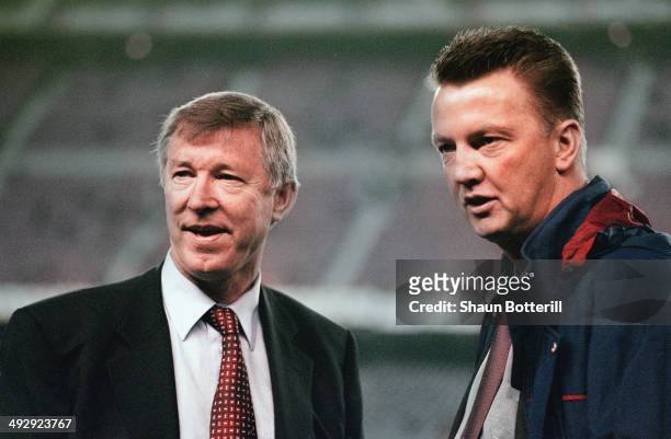Manchester United manager Alex Ferguson and Barcelona coach Louis Van Gaal chat before the UEFA Champions League match between Barcelona and...