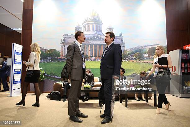 Visitors wait between sessions at the St. Petersburg International Economic Forum in Saint Petersburg, Russia, on Thursday, May 22, 2014. SPIEF is an...