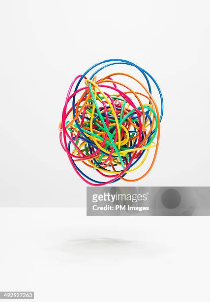 ball of colorful wires - cable mess stockfoto's en -beelden