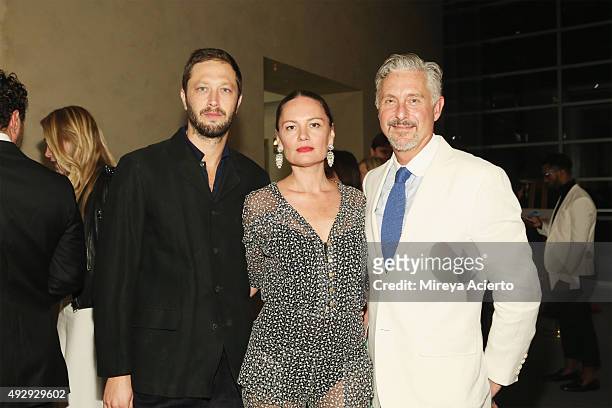 Ebon Moss-Bachrach, Yelena Yemchuk and David Kratz attend 2015 Take Home a Nude Art Auction and Party at Sotheby's on October 15, 2015 in New York...