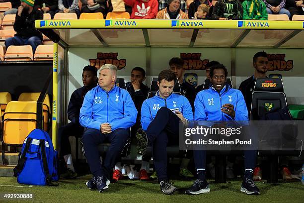 Coach Ugo Ehiogu and Assistant Coach Matthew Wells of Tottenham Hotspur during the Barclays U21 Premier League match between Norwich City U21 and...