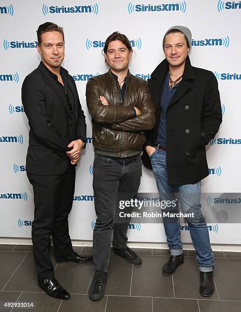 Isaac Hanson, Zac Hanson and Taylor Hanson of Hanson visit at SiriusXM Studios on October 16, 2015 in New York City.