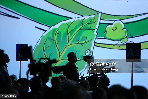 Television camera crews film a panel session on the opening day of the St. Petersburg International Economic Forum in Saint Petersburg, Russia, on...