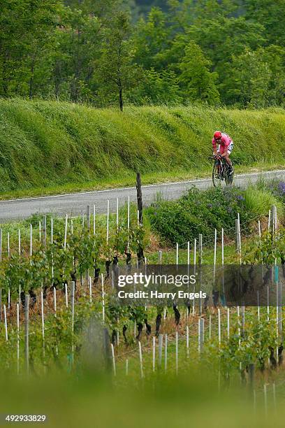 Wearer of the Maglia Rosa leader's jersey Cadel Evans of Australia and BMC Racing Team in action during the twelfth stage of the 2014 Giro d'Italia,...