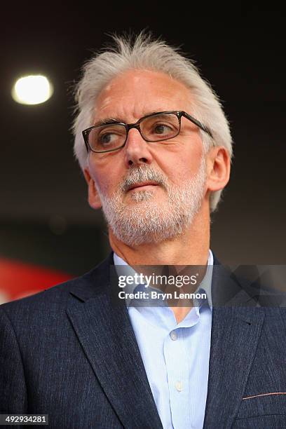 President of the Union Cycliste Internationale, Brian Cookson OBE, looks on as he awaits the podium ceremony after the twelfth stage of the 2014 Giro...