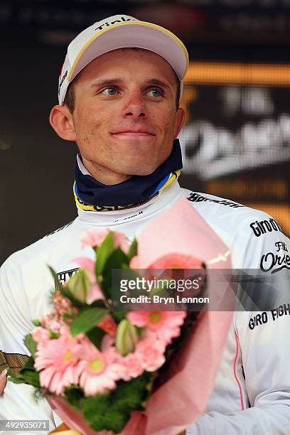 Rafal Majka of Poland and Tinkoff-Saxo celebrates retaining the maglia bianca, the best young rider classification after the twelfth stage of the...