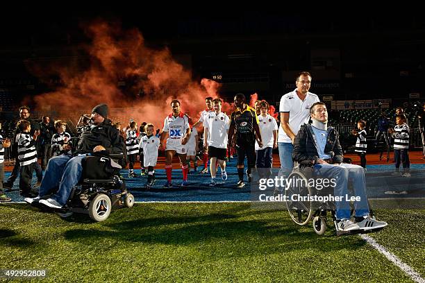 Matt Hampson and Joost Van der Westhuizen lead out the teams during the Matt Hampson Foundation England Legends XV v Joost Van der Westhuizen World...