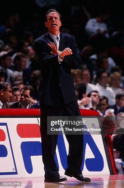 Head coach Doug Collins of the Detroit Pistons calls a play during the game against the Vancouver Grizzlies on March 26, 1996 at The Palace of Auburn...