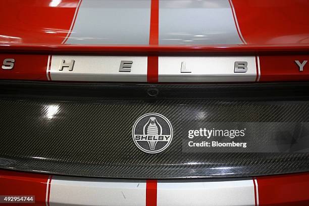 Cobra logos are seen on a Mustang sports car at the Shelby American Inc. World headquarters in Las Vegas, Nevada, U.S., on Wednesday, Oct. 14, 2015....
