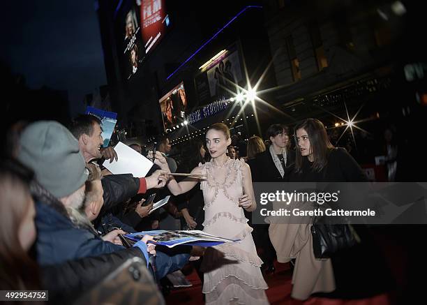 Rooney Mara signs autographs during the 'Carol' American Express Gala during the BFI London Film Festival, at the Odeon Leicester Square on October...