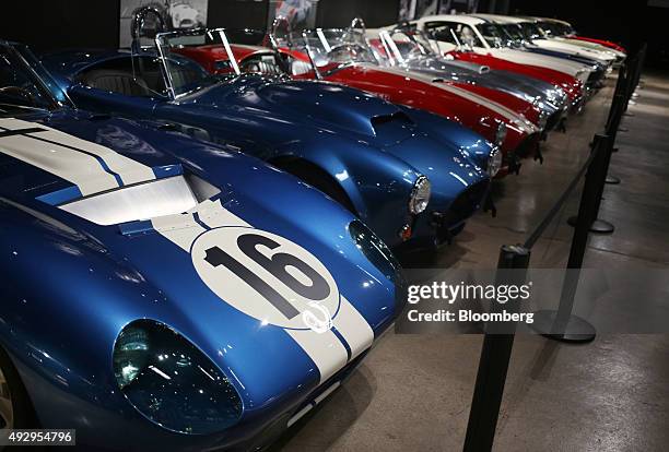 Vintage Cobra sports cars sit parked on display inside the Shelby American Inc. World headquarters in Las Vegas, Nevada, U.S., on Wednesday, Oct. 14,...