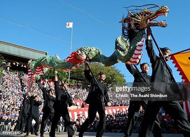 Dragon dance is performed during the Nagasaki Kunchi Festival on October 7, 2015 in Nagasaki, Japan.