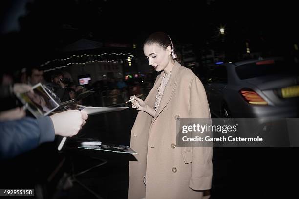 Rooney Mara signs autographs during the 'Carol' American Express Gala during the BFI London Film Festival, at the Odeon Leicester Square on October...