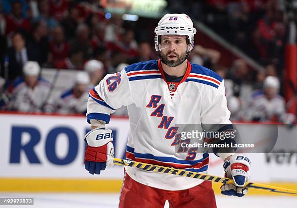 Martin St. Louis of the New York Rangers looks on in Game Two of the Eastern Conference Final against the Montreal Canadiens during the 2014 NHL...
