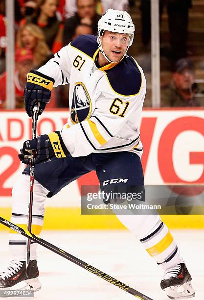 Andre Benoit of the Buffalo Sabres plays against the Chicago Blackhawks during the game at the United Center on October 11, 2014 in Chicago, Illinois.