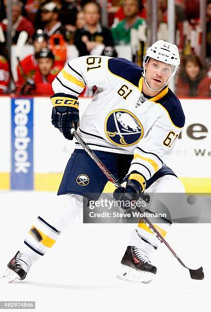 Andre Benoit of the Buffalo Sabres plays against the Chicago Blackhawks during the game at the United Center on October 11, 2014 in Chicago, Illinois.