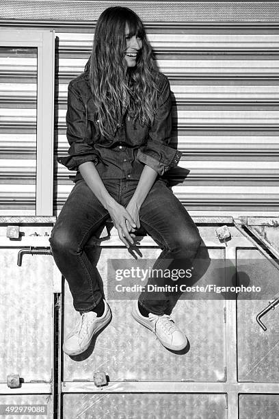 Model, music producer and actress Caroline de Maigret is photographed for Madame Figaro on July 9, 2015 in Paris, France. Shirt , jeans , socks ,...