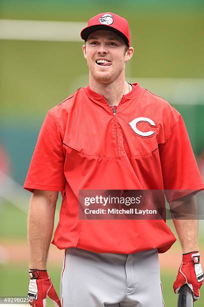 Brennan Boesch of the Cincinnati Reds looks on during batting practice of a baseball game against the Washington Nationals at Nationals Park on...